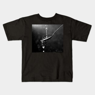 Drops of water fall on a spoon Kids T-Shirt